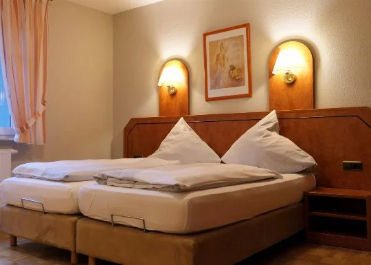 Schlafzimmer in einer Ferienwohnung im Appartementhaus Dallacker in Duhnen